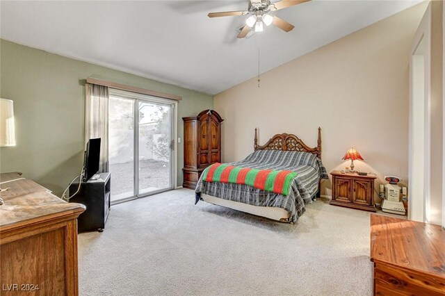 carpeted bedroom with ceiling fan, access to outside, and lofted ceiling