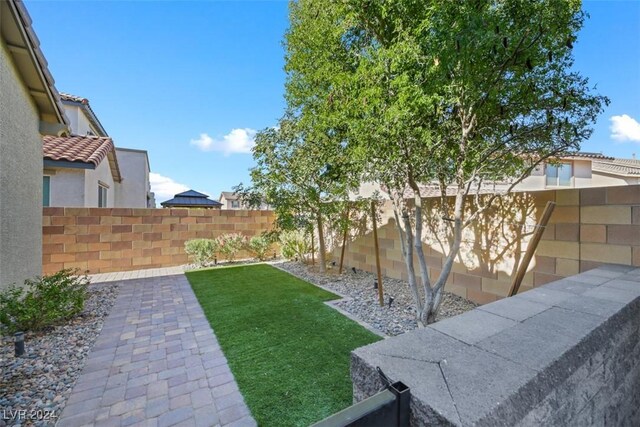 view of yard with a fenced backyard