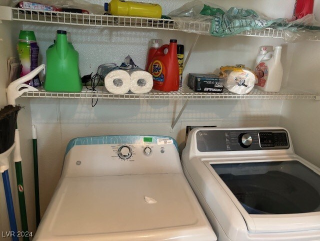 laundry room with separate washer and dryer