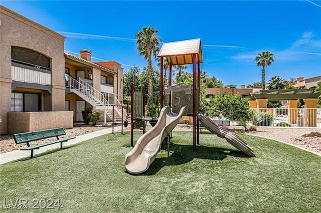 view of play area featuring a yard