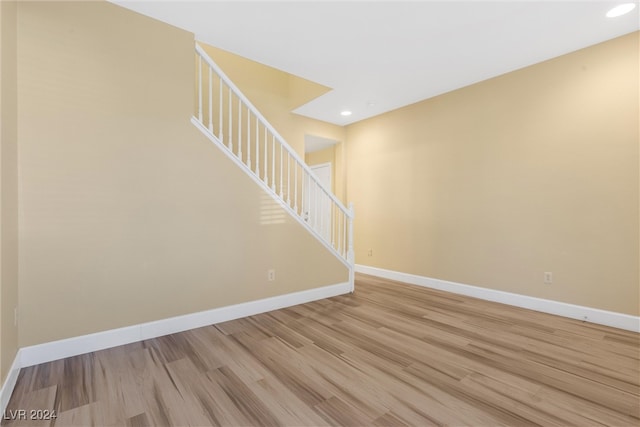 spare room with light wood-type flooring