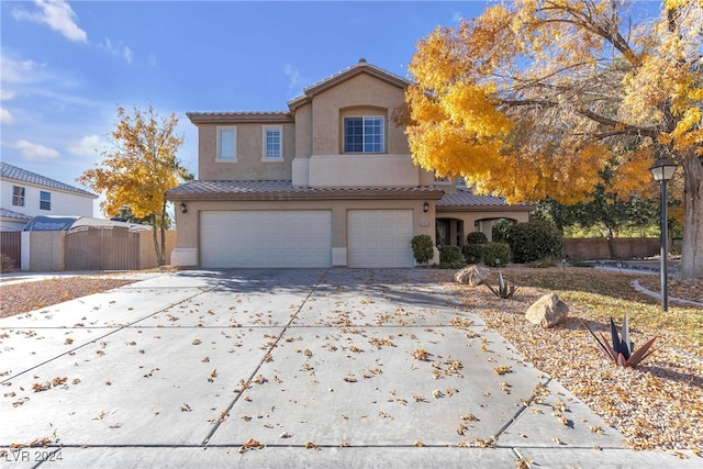 view of front of property featuring a garage