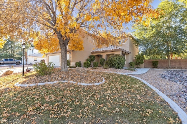 view of front of property with a garage