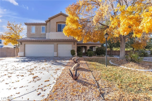 view of front of property featuring a garage