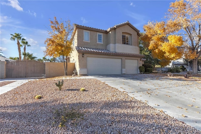 view of front of home with a garage