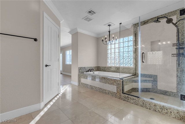 bathroom with ornamental molding, separate shower and tub, plenty of natural light, and a notable chandelier