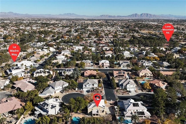 drone / aerial view featuring a mountain view