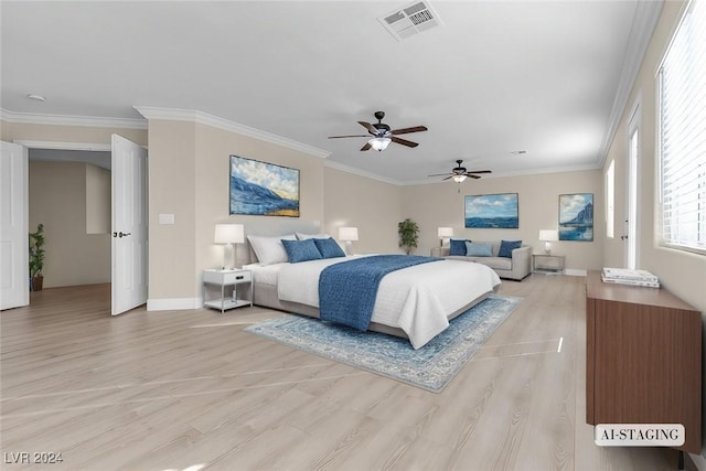 bedroom featuring ceiling fan, crown molding, and light hardwood / wood-style floors