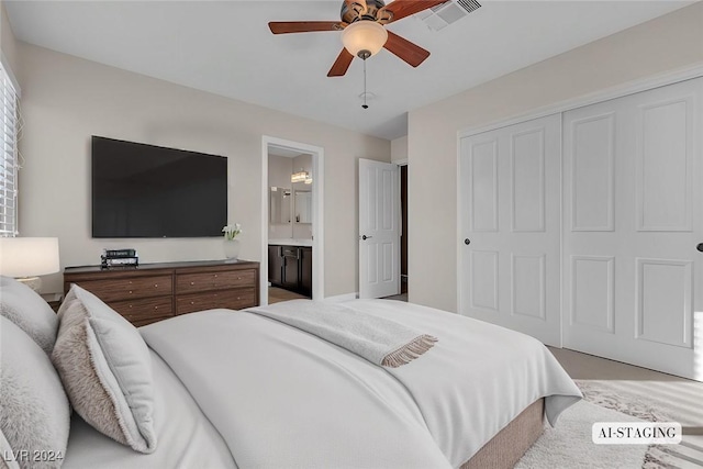 bedroom with a closet, ceiling fan, and ensuite bathroom