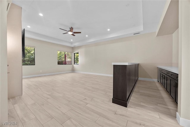 empty room featuring light hardwood / wood-style floors and ceiling fan