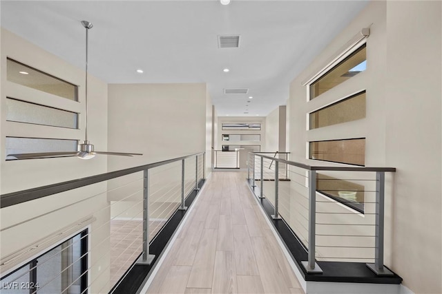 hallway featuring light hardwood / wood-style flooring