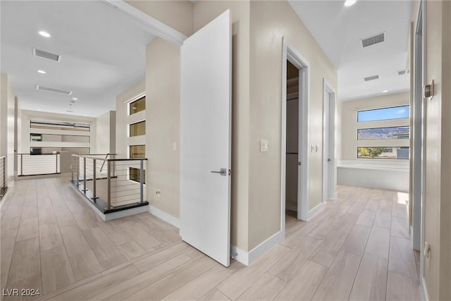 hallway featuring light hardwood / wood-style floors