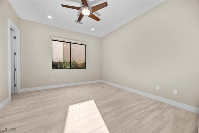 unfurnished room featuring ceiling fan and light hardwood / wood-style flooring