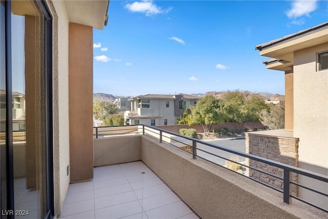 balcony featuring a mountain view