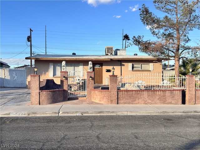 view of front of home featuring central air condition unit