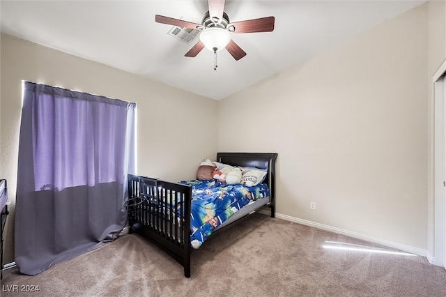 carpeted bedroom with ceiling fan