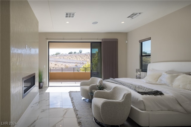 bedroom featuring multiple windows