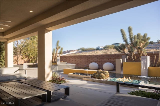 view of patio featuring ceiling fan and an outdoor hangout area