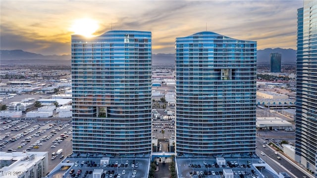 view of outdoor building at dusk