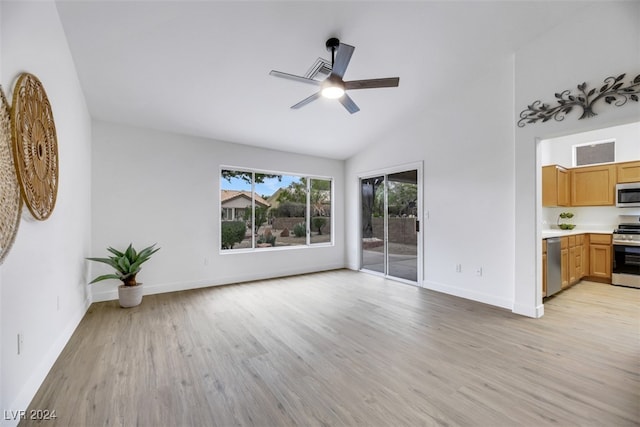 unfurnished living room with light wood-type flooring, vaulted ceiling, and ceiling fan