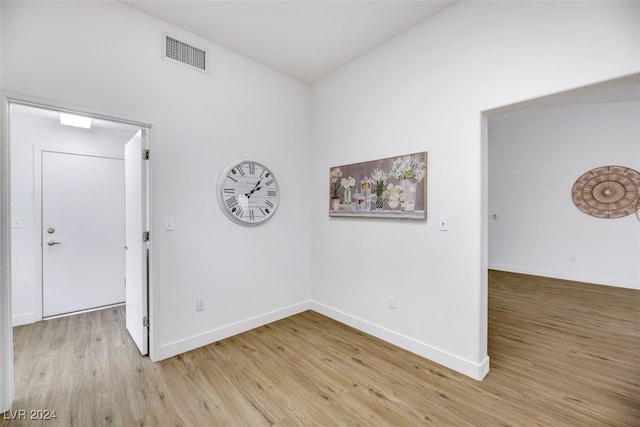 spare room featuring light hardwood / wood-style flooring