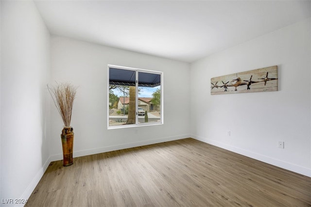 unfurnished room featuring light wood-type flooring