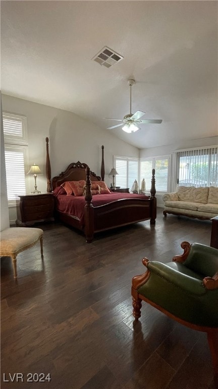 bedroom featuring ceiling fan, lofted ceiling, and dark wood-type flooring