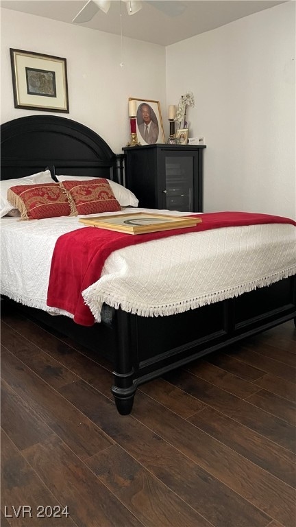 bedroom featuring hardwood / wood-style floors and ceiling fan