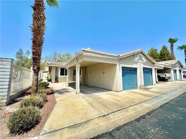 view of front of home with a garage