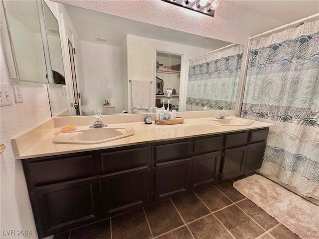 2153 Camel Mesa Dr, Laughlin, NV 89029 - bathroom with double vanity and tile patterned floors