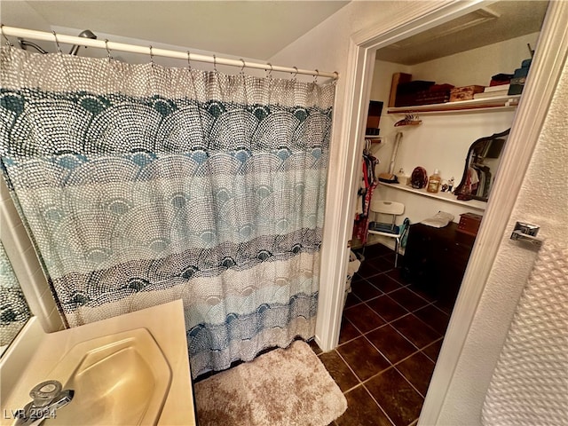 bathroom featuring tile patterned floors and sink