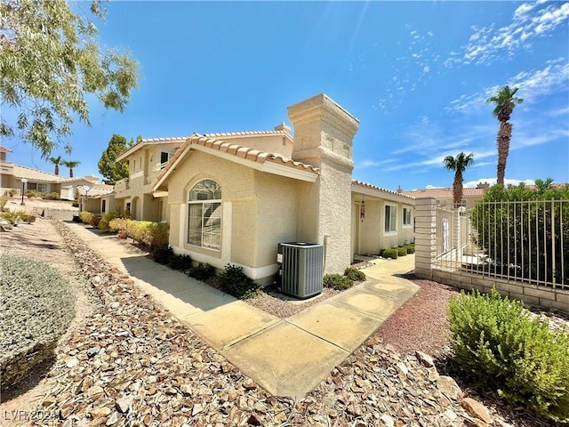 2153 Camel Mesa Dr, Laughlin, NV 89029 - view of property exterior featuring stucco siding and a tiled roof