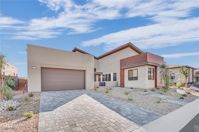 view of front of property with a garage