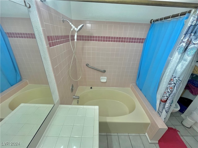 bathroom with tile patterned flooring and shower / tub combo with curtain