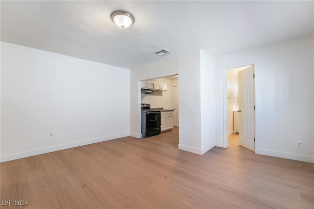 unfurnished living room with light wood-type flooring