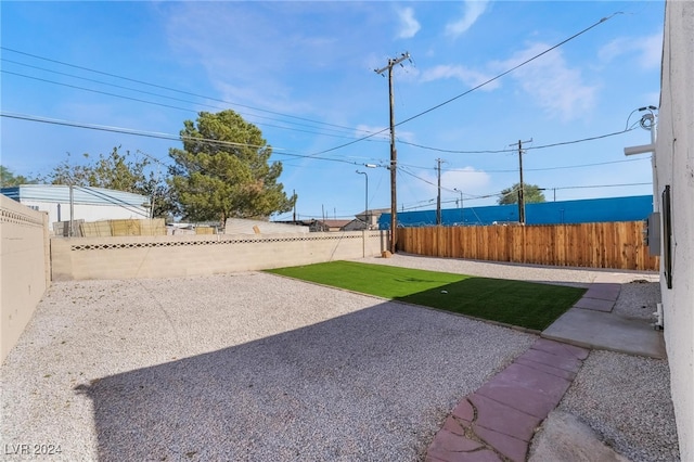 view of yard with a patio area