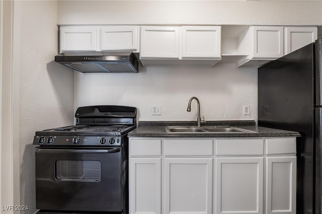 kitchen featuring white cabinets, sink, ventilation hood, and black appliances