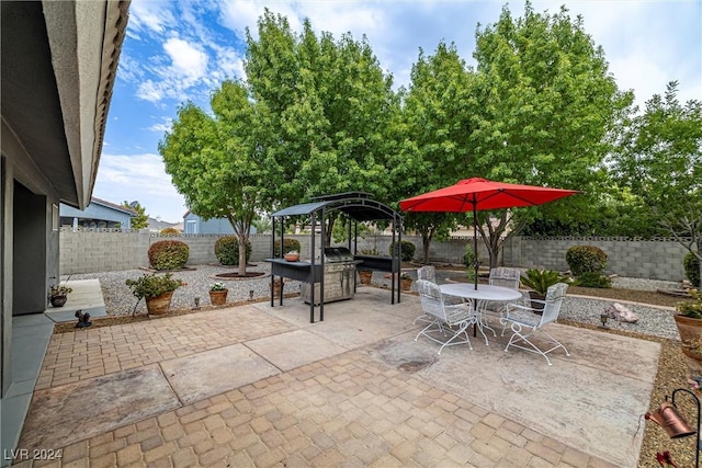 view of patio with exterior kitchen