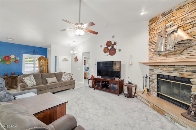 carpeted living room with ceiling fan, high vaulted ceiling, and a fireplace