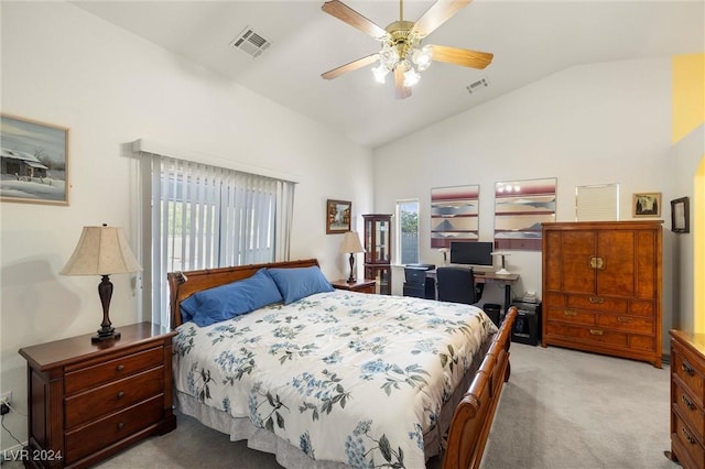 bedroom with ceiling fan, vaulted ceiling, and light carpet