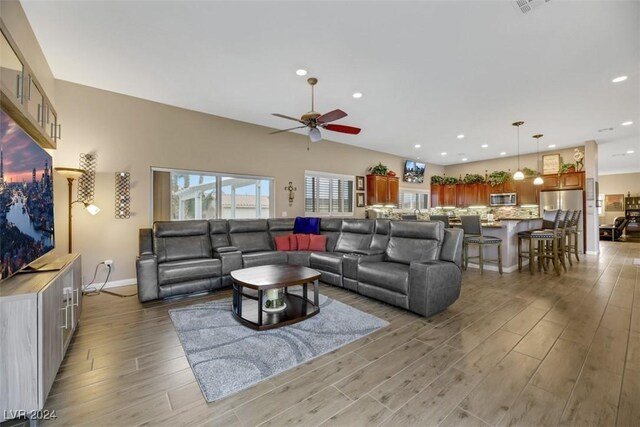 living room with ceiling fan