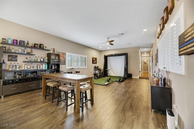 dining area featuring ceiling fan and hardwood / wood-style floors