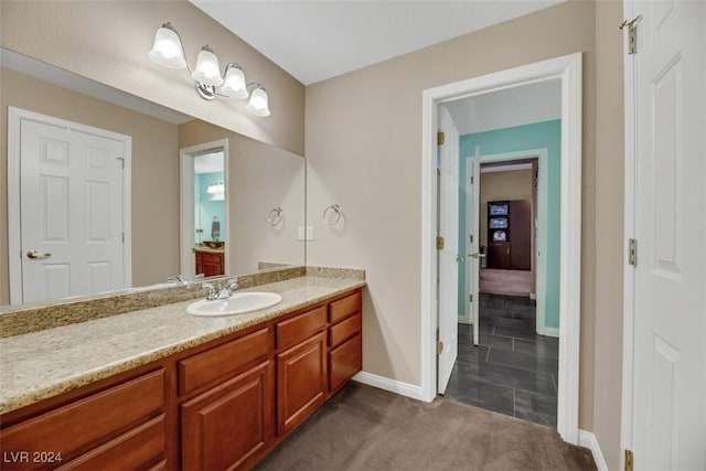 bathroom with vanity and tile patterned floors