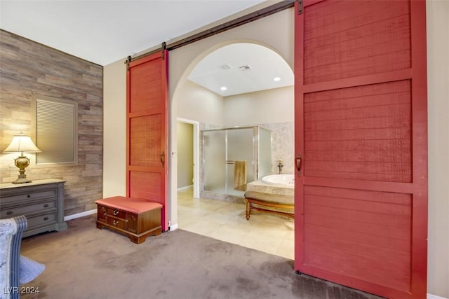 full bathroom featuring visible vents, a stall shower, an accent wall, and a bath