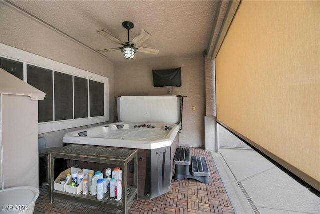 view of patio / terrace featuring ceiling fan