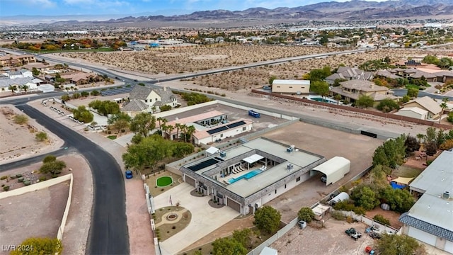 aerial view featuring view of desert and a mountain view