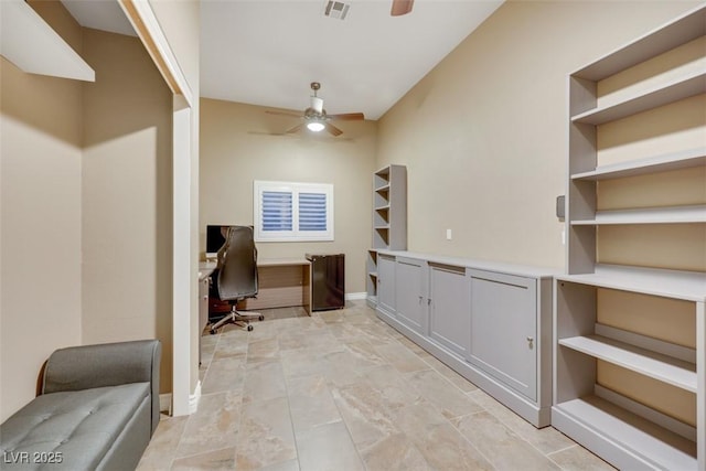 office featuring visible vents, baseboards, and a ceiling fan