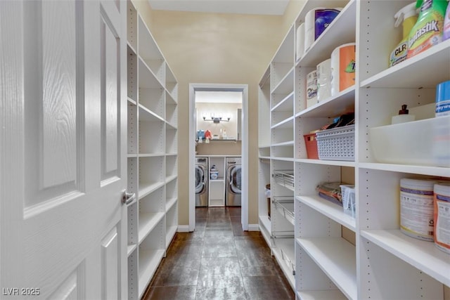 storage area with washer and dryer