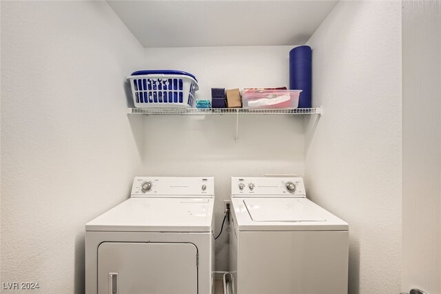 laundry area featuring washing machine and dryer