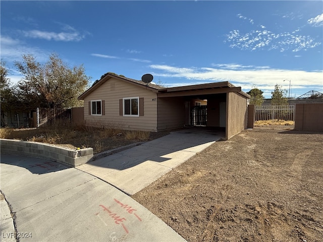 view of front of house featuring a carport